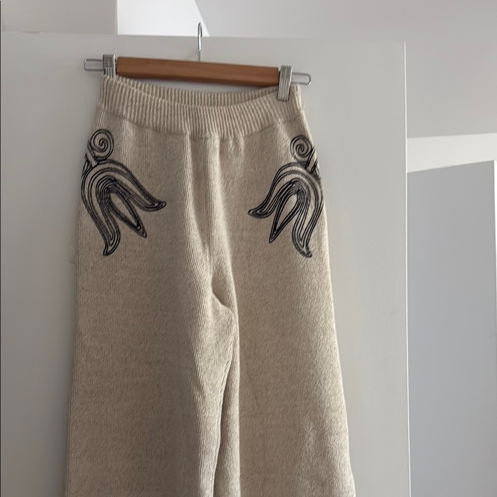 Nanushka Cream Pants with Black Embroidery